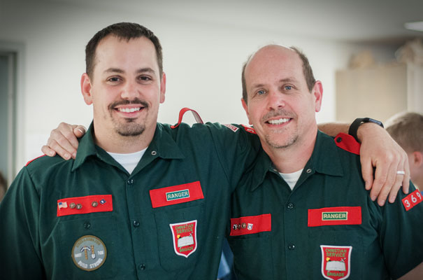 Brigade Leaders offering discipleship wearing green and red uniforms with unit bages Brigade Leaders offering discipleship wearing green and red uniforms with unit bages